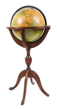 A Replogle Twelve Inch Library Globe Diameter of globe 12 inches, height overall 34 1/4 inches.