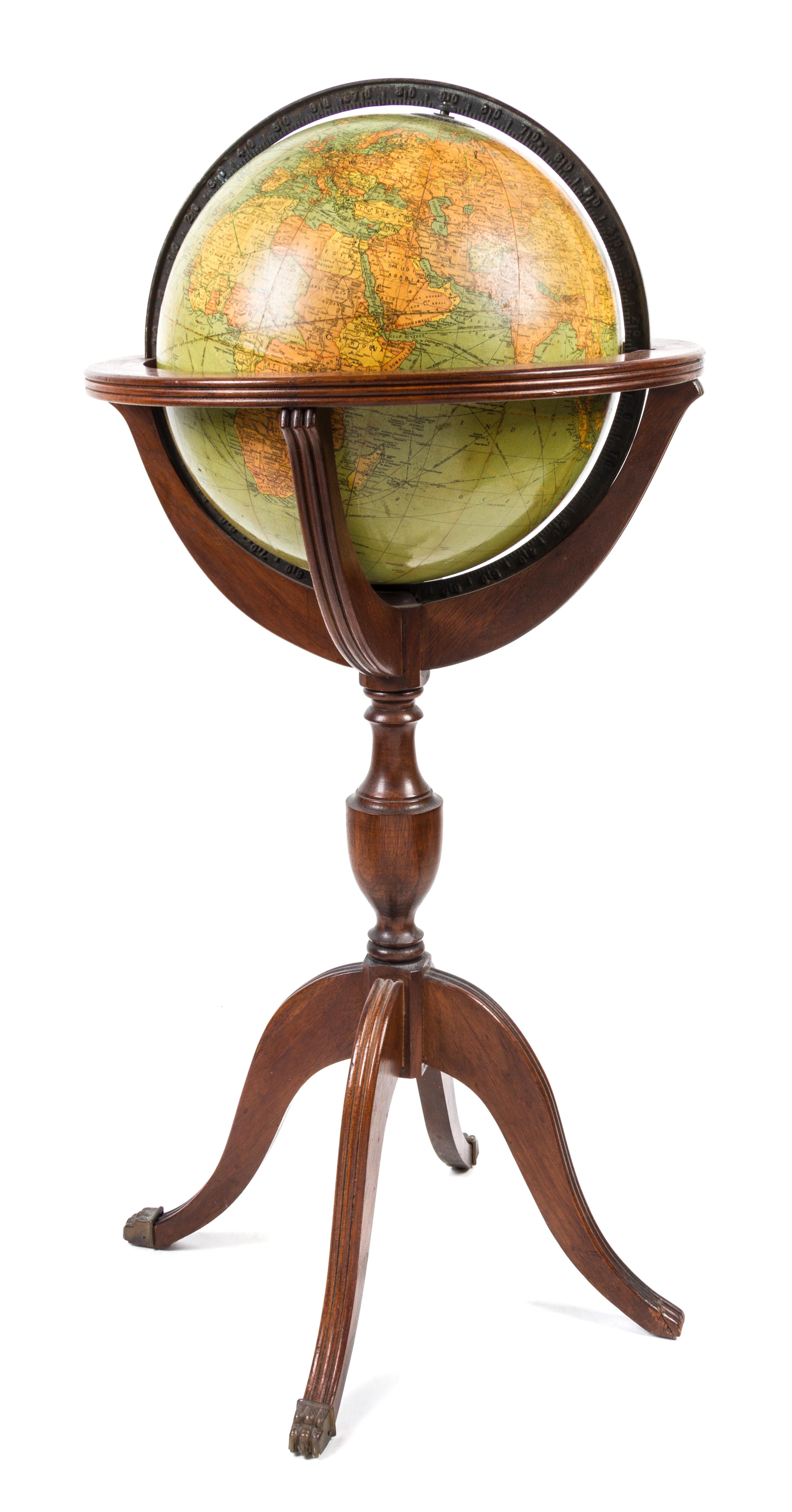 A Replogle Twelve Inch Library Globe Diameter of globe 12 inches, height overall 34 1/4 inches.