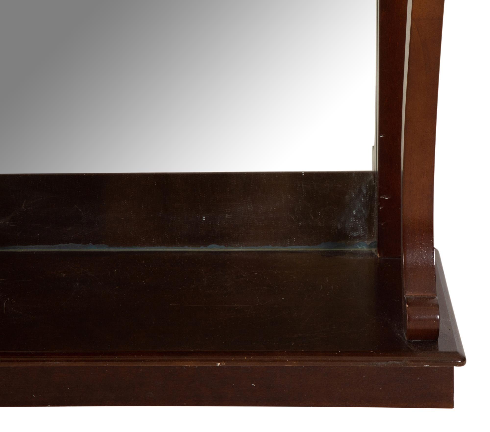 A Pair of Empire Style Gilt Metal Mounted Mahogany Console Tables