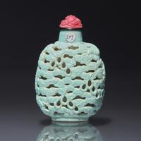 A Chinese Turquoise-Glazed Reticulated Porcelain "Dragon" Snuff Bottle, Qing Dynasty, Second Half 19th Century — 清晚期 松石釉鏤雕龍戲珠圖鼻煙壺