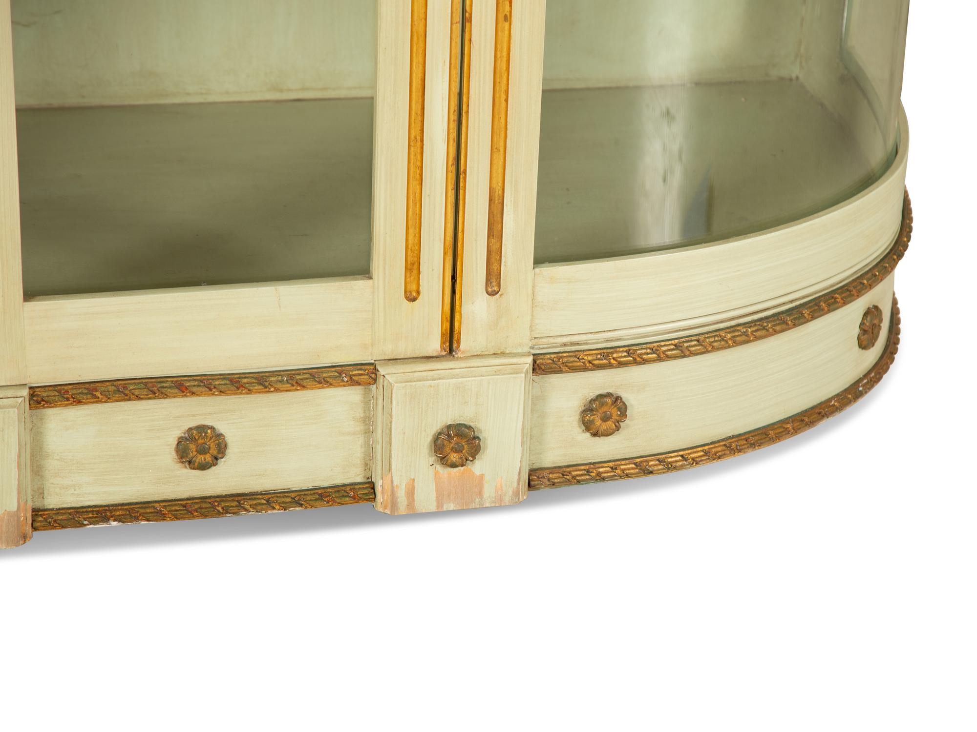 An Empire Style Painted and Parcel Gilt Vitrine Cabinet