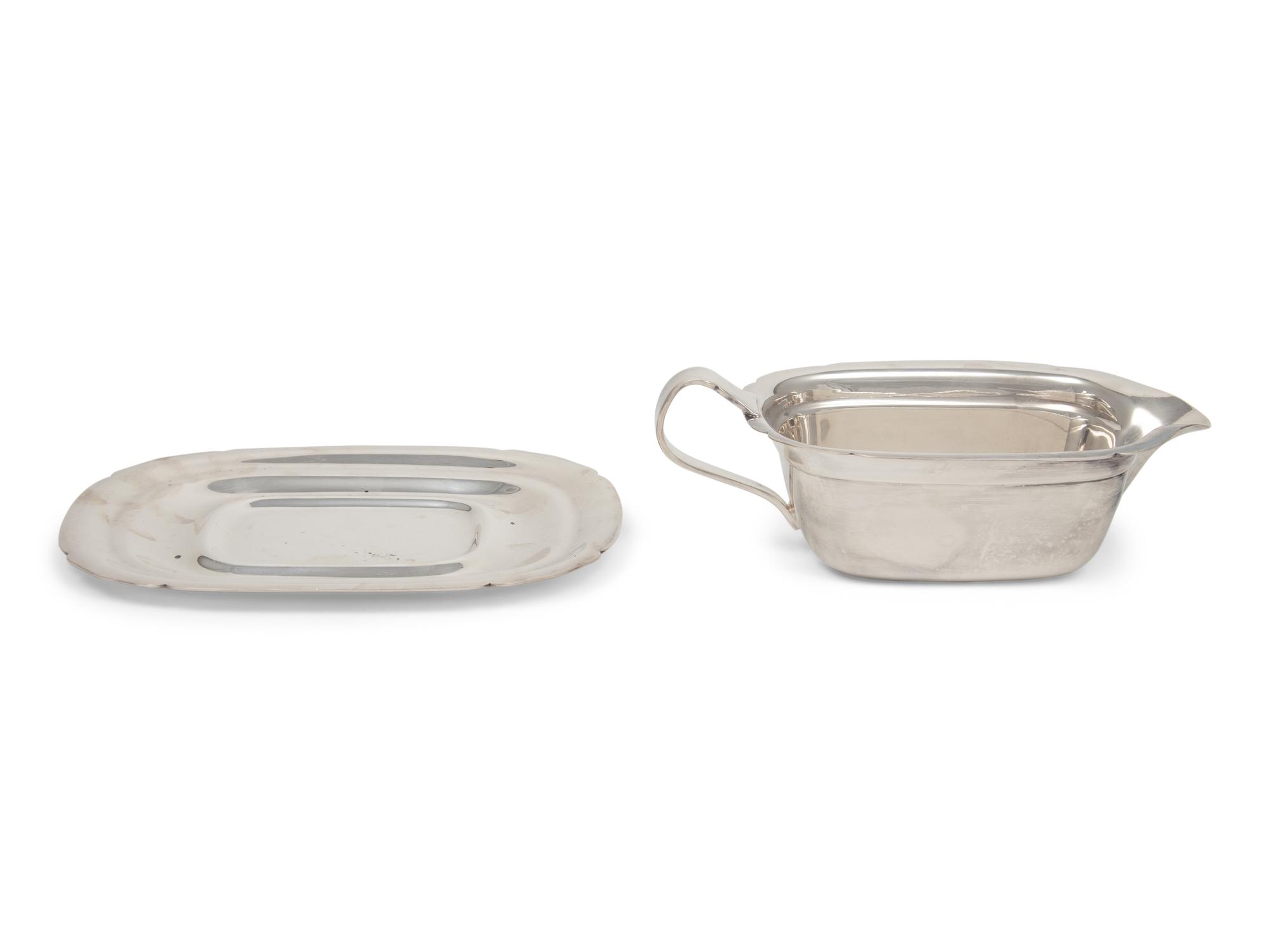 A Reed & Barton Silver-Plate Creamer and Underplate