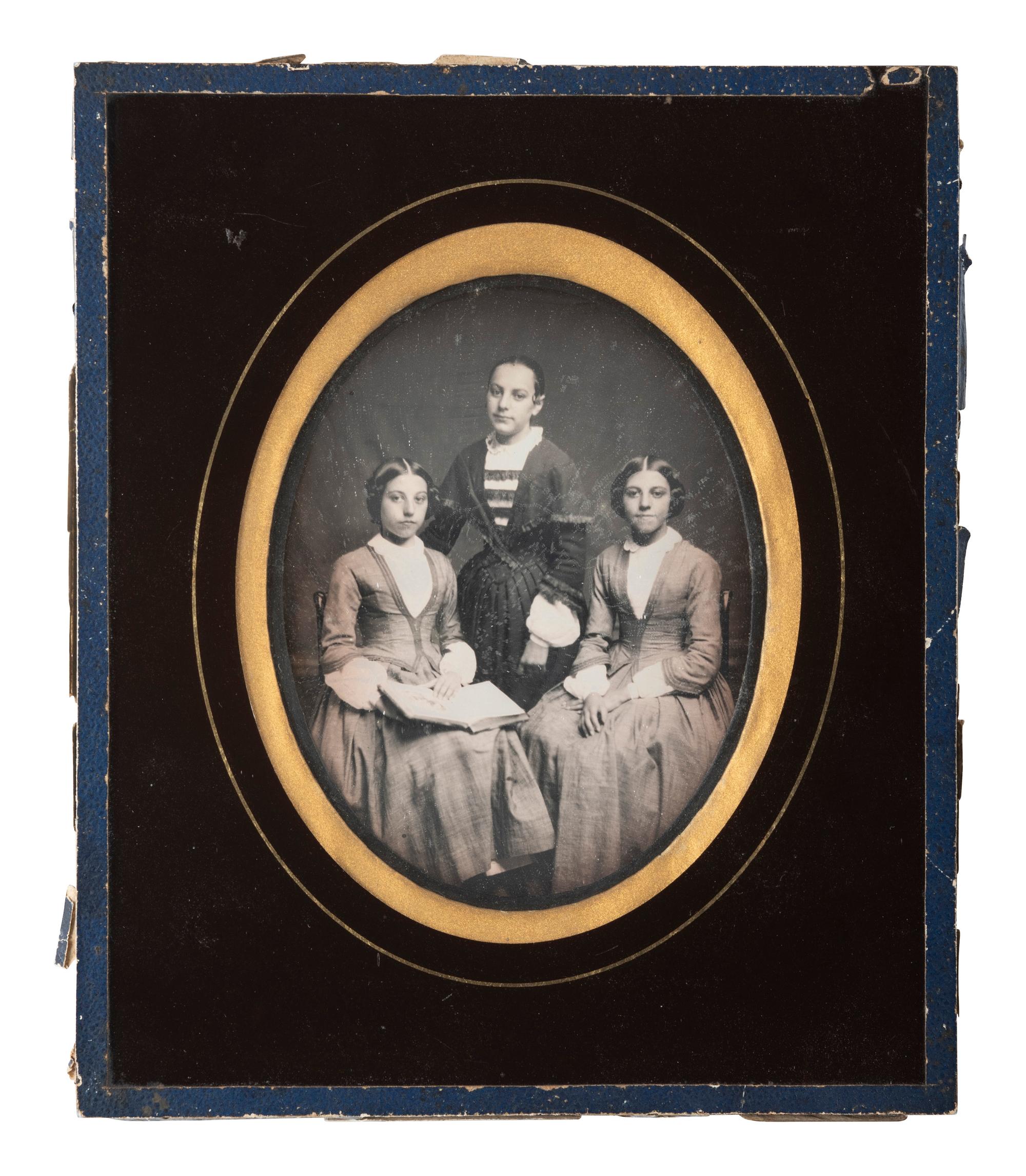 [EARLY PHOTOGRAPHY]. 8 likely European daguerreotype portraits of groups in passe partout mounts.