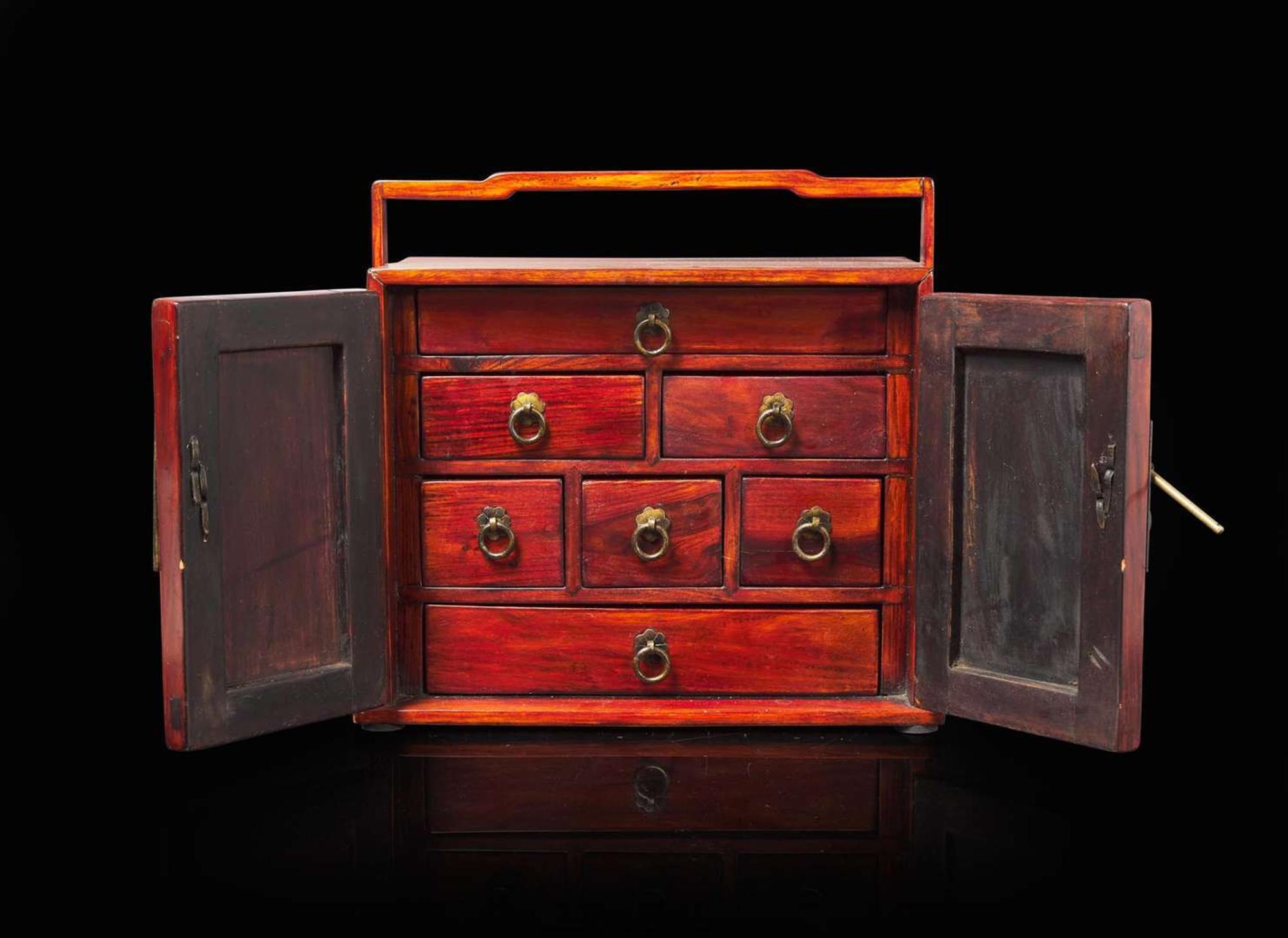 A small huanghuali and mixed woods travelling table cabinet 黃花梨及其他木料小櫃一件