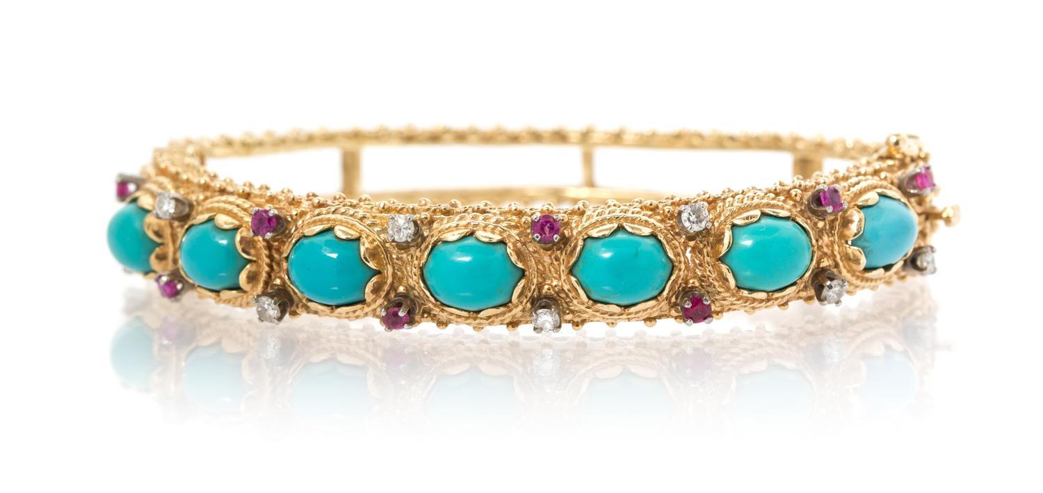 A 14 Karat Yellow Gold, Turquoise, Diamond and Ruby Bangle Bracelet, 22.60 dwts.
