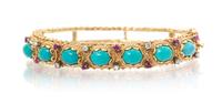 A 14 Karat Yellow Gold, Turquoise, Diamond and Ruby Bangle Bracelet, 22.60 dwts.