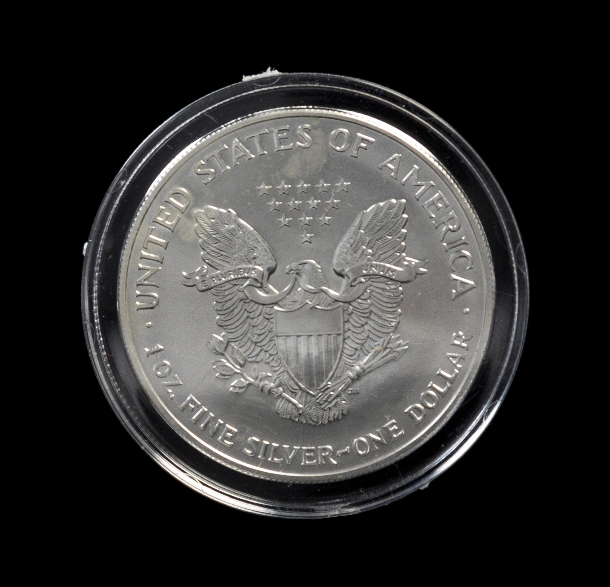 A Group of Seven United States Silver Eagle Colorized Dollar Coins