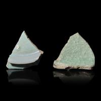 Two Chinese Celadon Glazed Ceramic Fragments, Song Dynasty — 宋 汝窯及官窯帶支釘瓷片兩枚