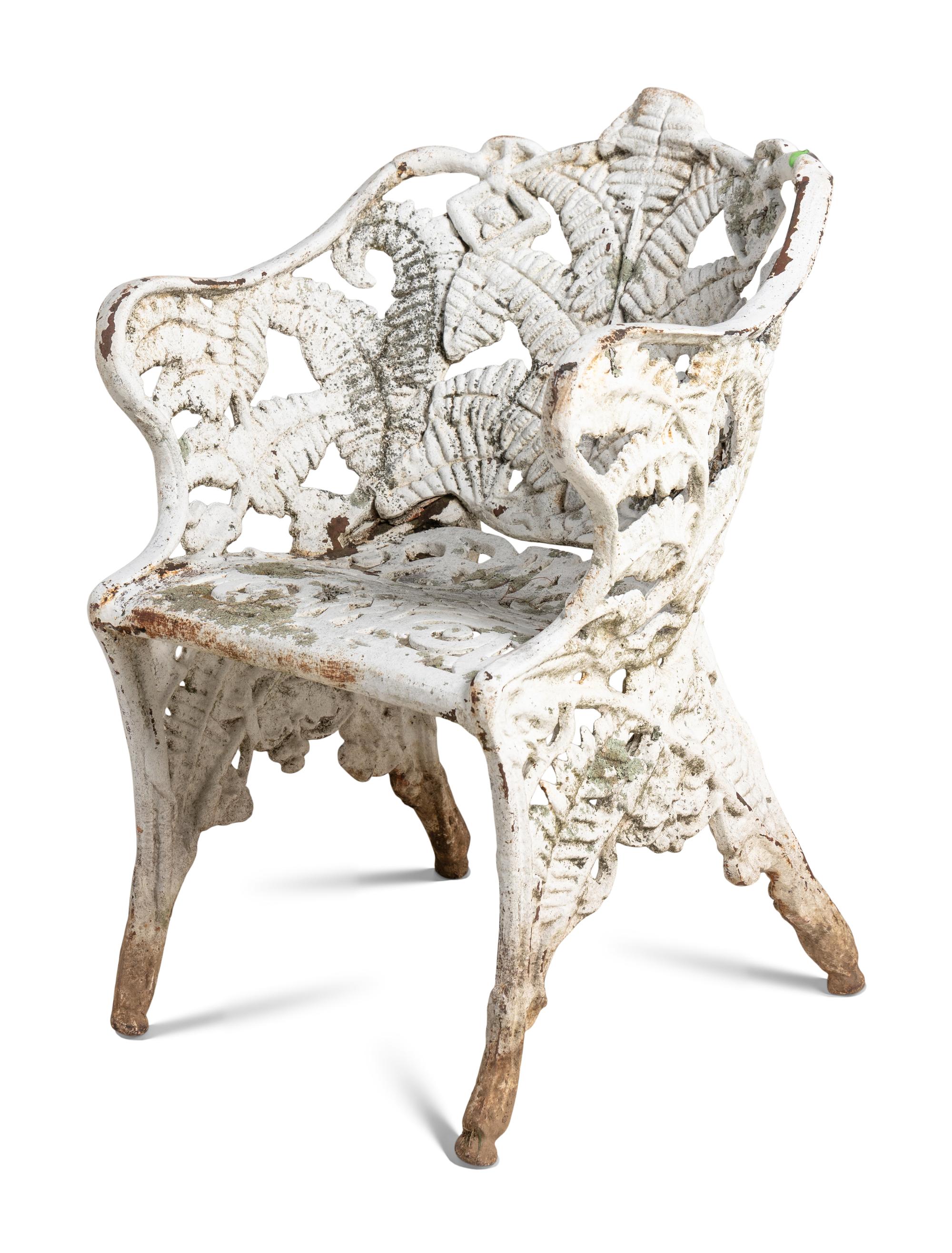 A Victorian Cast Iron Three-Piece Garden Seating Suite