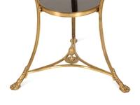 An Empire Style Gilt Metal and Black Granite Guéridon