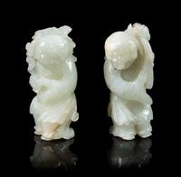 Two Pale Celadon Jade Figures of He He Er Xian Height of taller 3 1/4 inches. — 18TH/19TH CENTURY