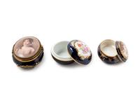Three Continental Painted and Parcel Gilt Porcelain Boxes