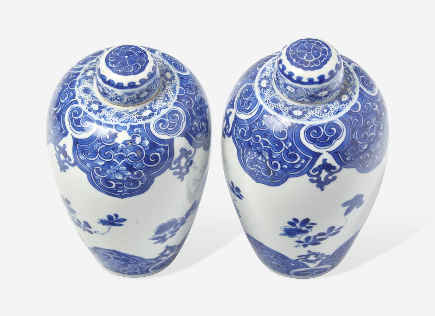 A Similar Pair of Chinese Blue and White Ovoid Jars and Covers