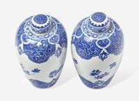 A Similar Pair of Chinese Blue and White Ovoid Jars and Covers