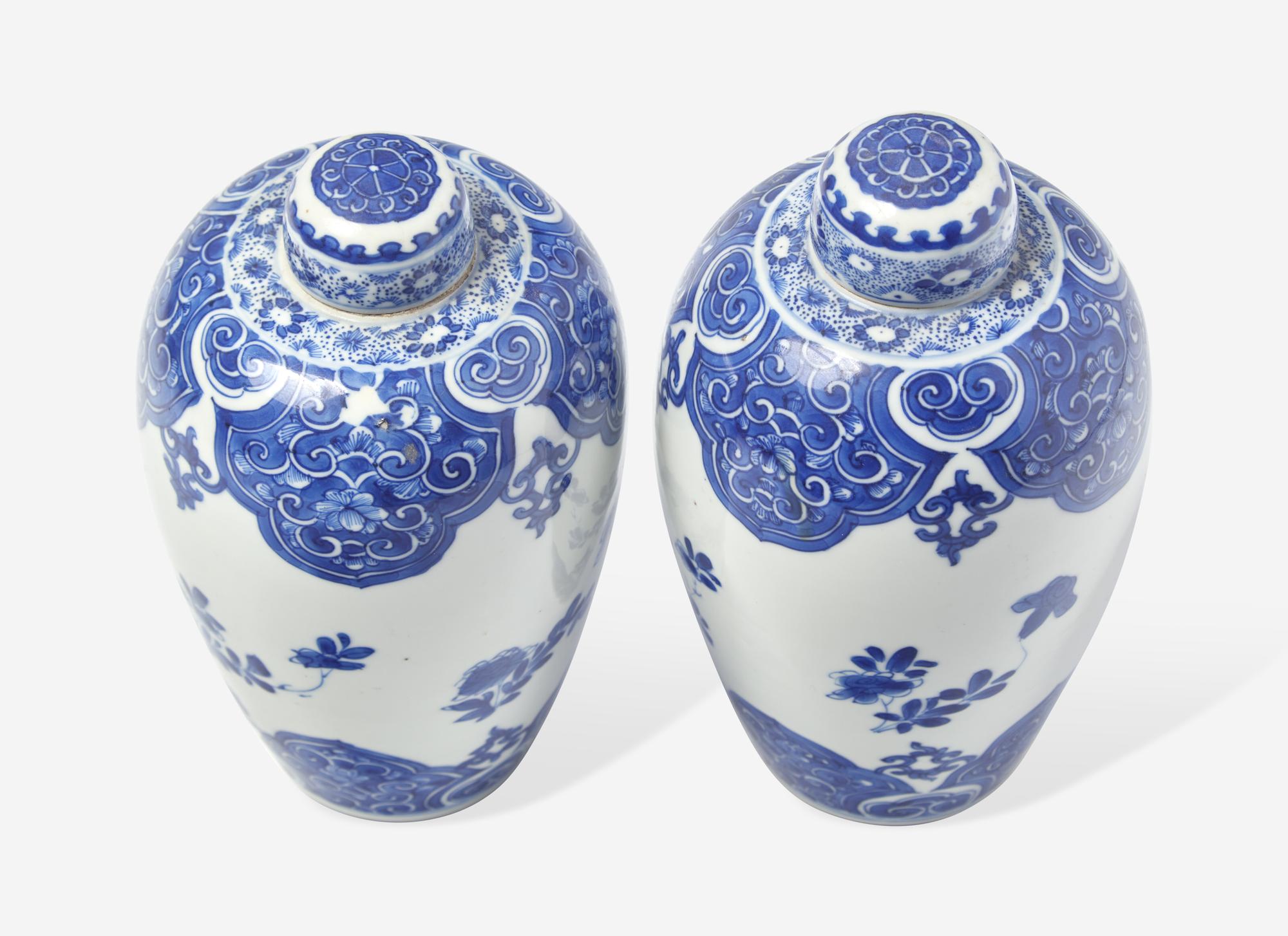 A Similar Pair of Chinese Blue and White Ovoid Jars and Covers