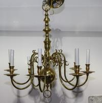 A Dutch Baroque Style Eight-Light Chandelier Height 29 inches. — 20TH CENTURY