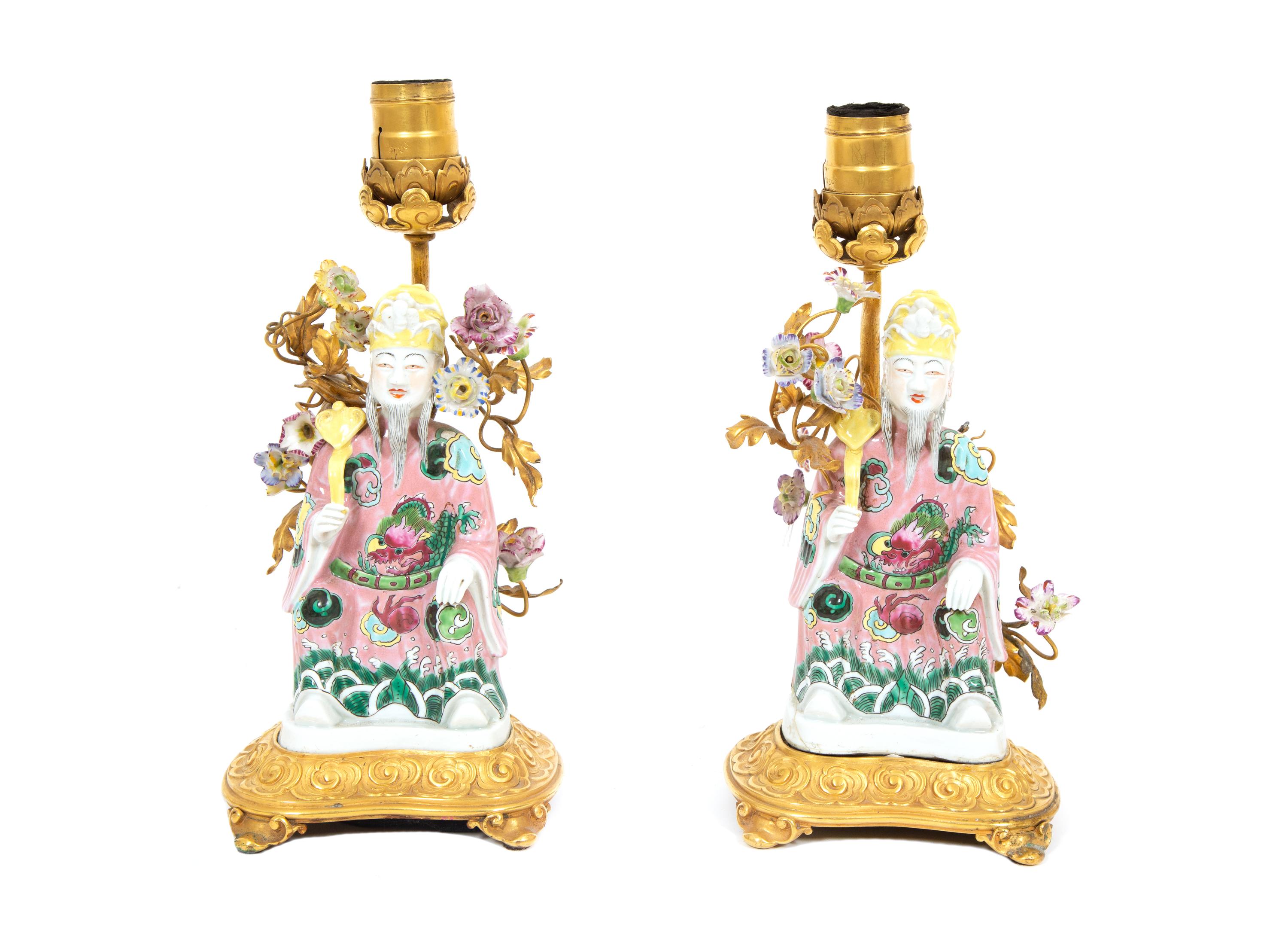 A Pair of Chinese Export Gilt Bronze Mounted Porcelain Figural Lamps