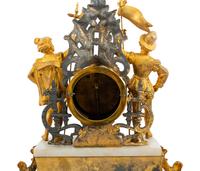 A Gilt Metal Mantel Clock