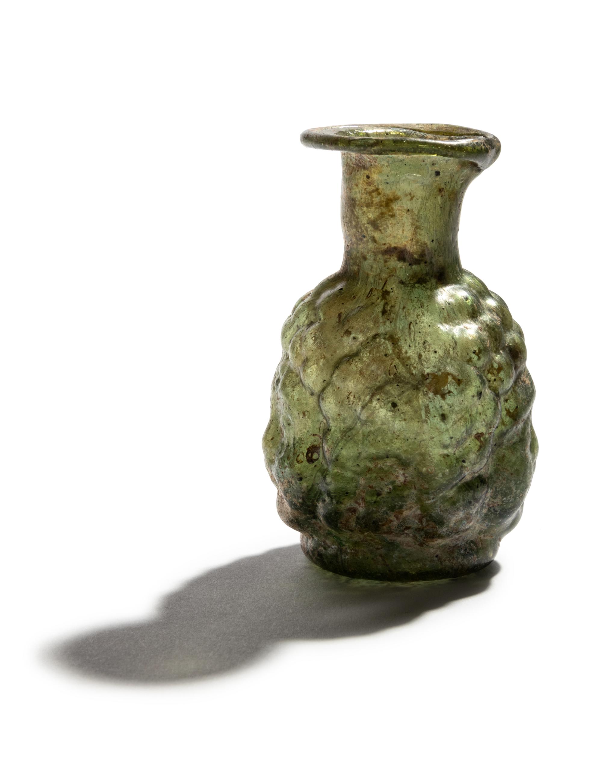 A Roman Glass Double-Head Flask
