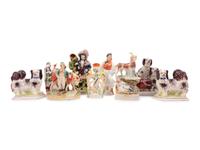 A Group of Eight Staffordshire Pottery Figures