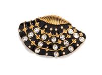 A Kenneth Jay Lane Black Clamshell Brooch, 3.5" x 2.25".
