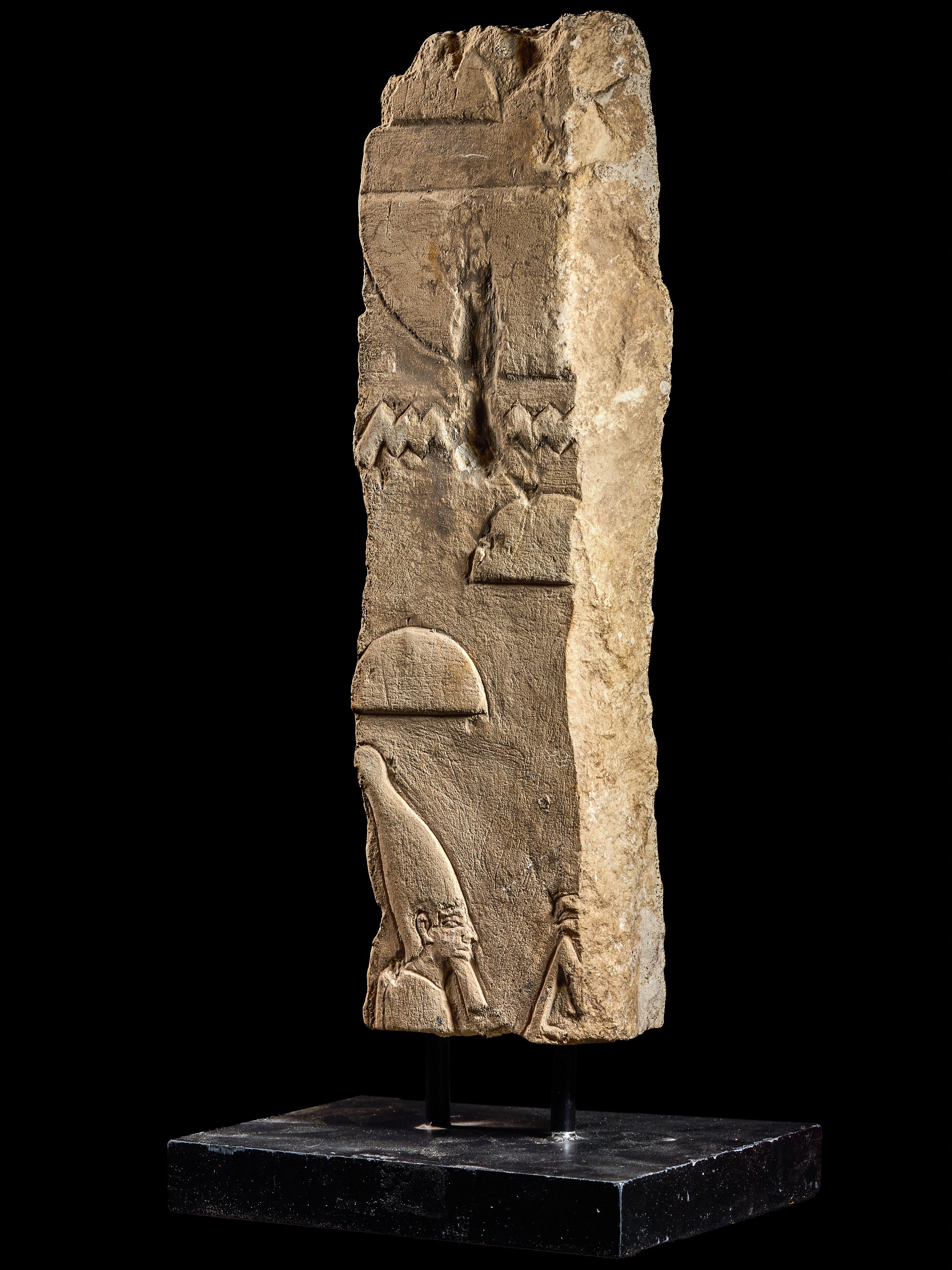 An Egyptian Limestone Relief Fragment with a Pharaoh