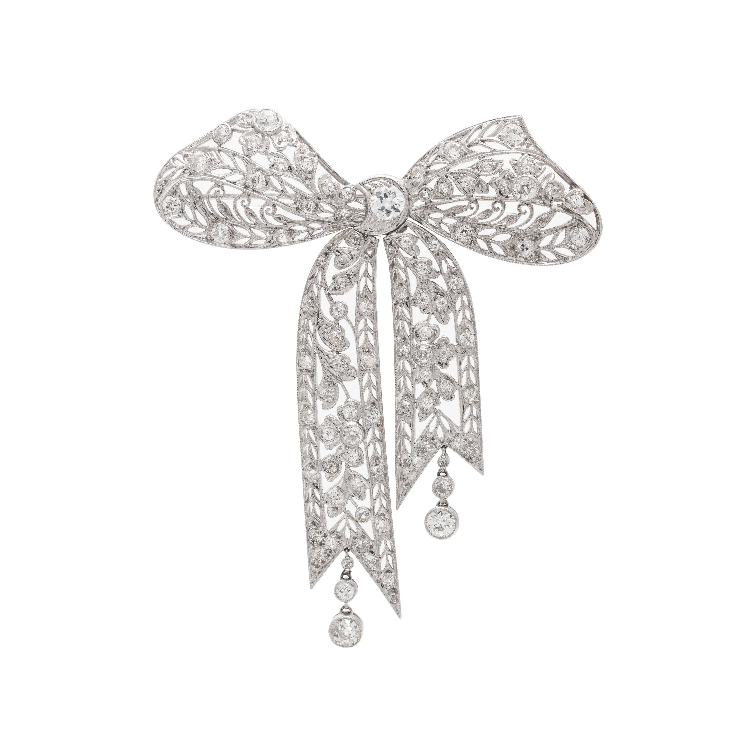 PLATINUM AND DIAMOND BOW BROOCH