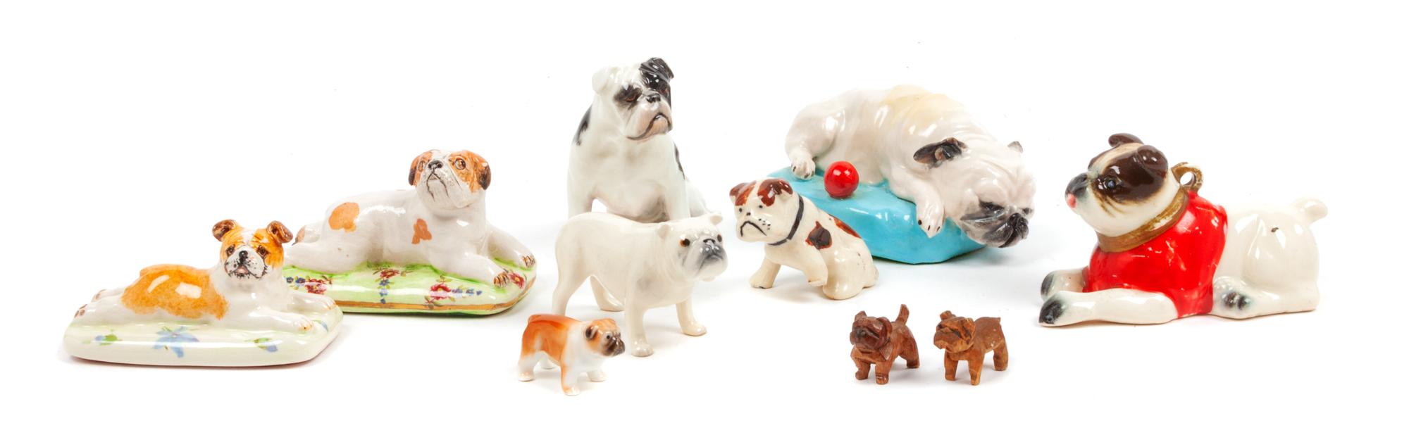 A Group of Ten Porcelain and Wood Bulldogs Width of widest 4 inches.