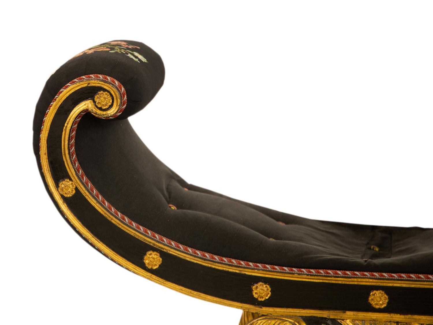 A Regency Ebonized and Parcel Gilt Curule Form Bench