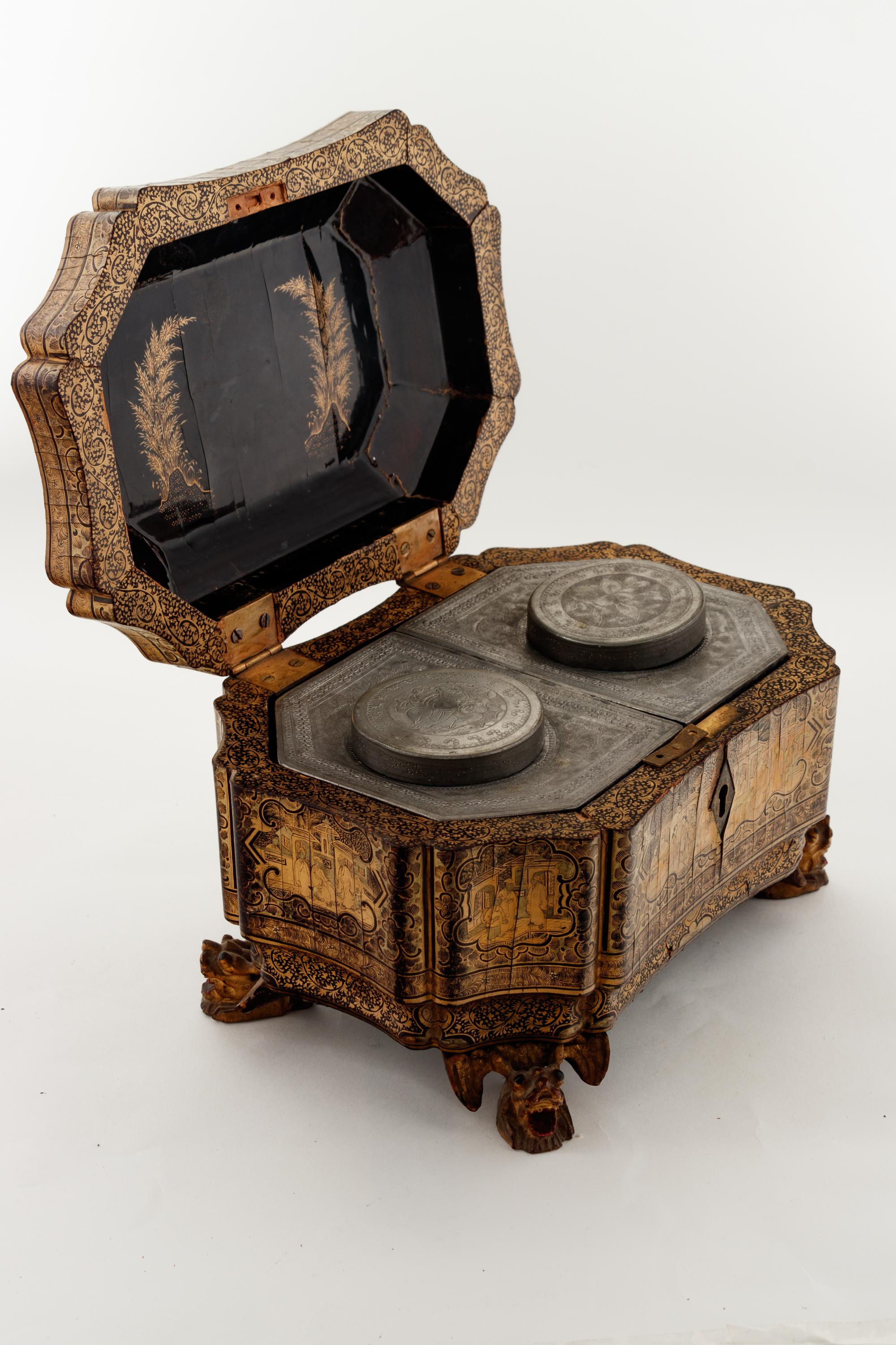 A Chinese Export Gilt Decorated Black Lacquer Tea Caddy