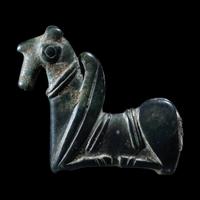 A Luristan Bronze Pin Finial- Provenance: Mathias Komor, New York, prior to 1955. Acquired by the present owner from the above, 17 December 1955.