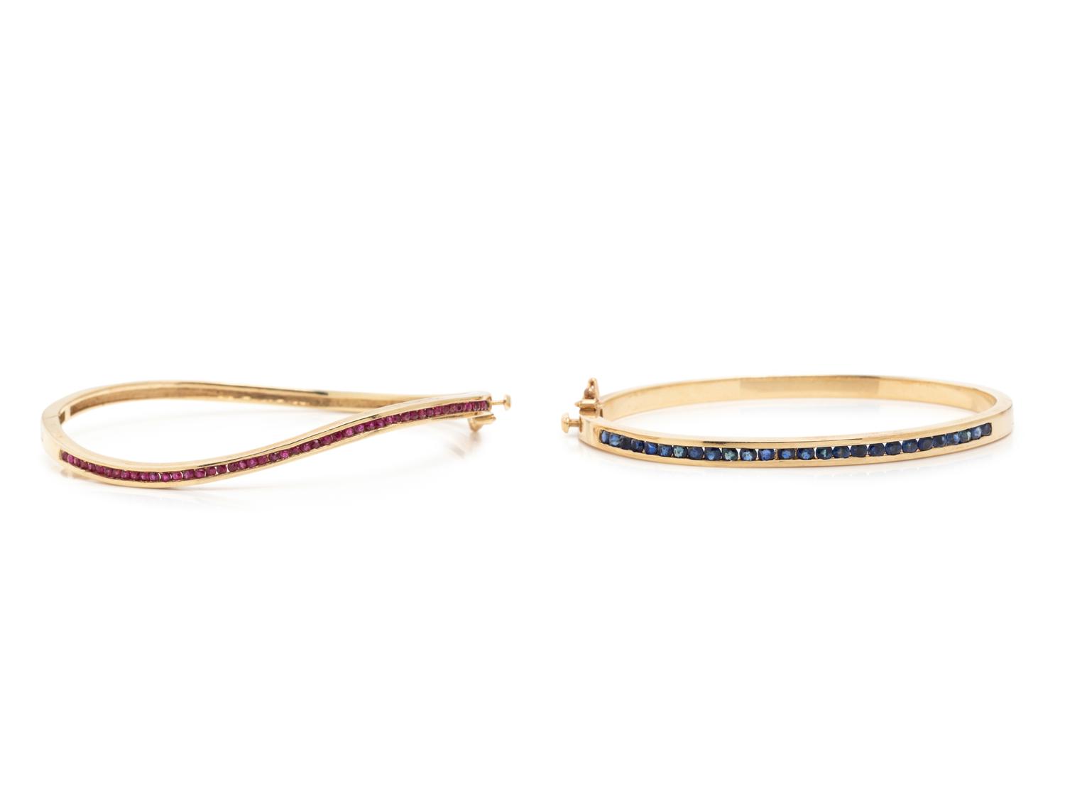 COLLECTION OF YELLOW GOLD AND GEMSTONE BANGLE BRACELETS