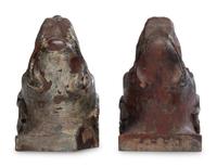 A Pair of Carved Walnut Dog-Form Wall Mounts