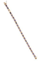 A 14 Karat Yellow Gold and Tanzanite Bracelet,