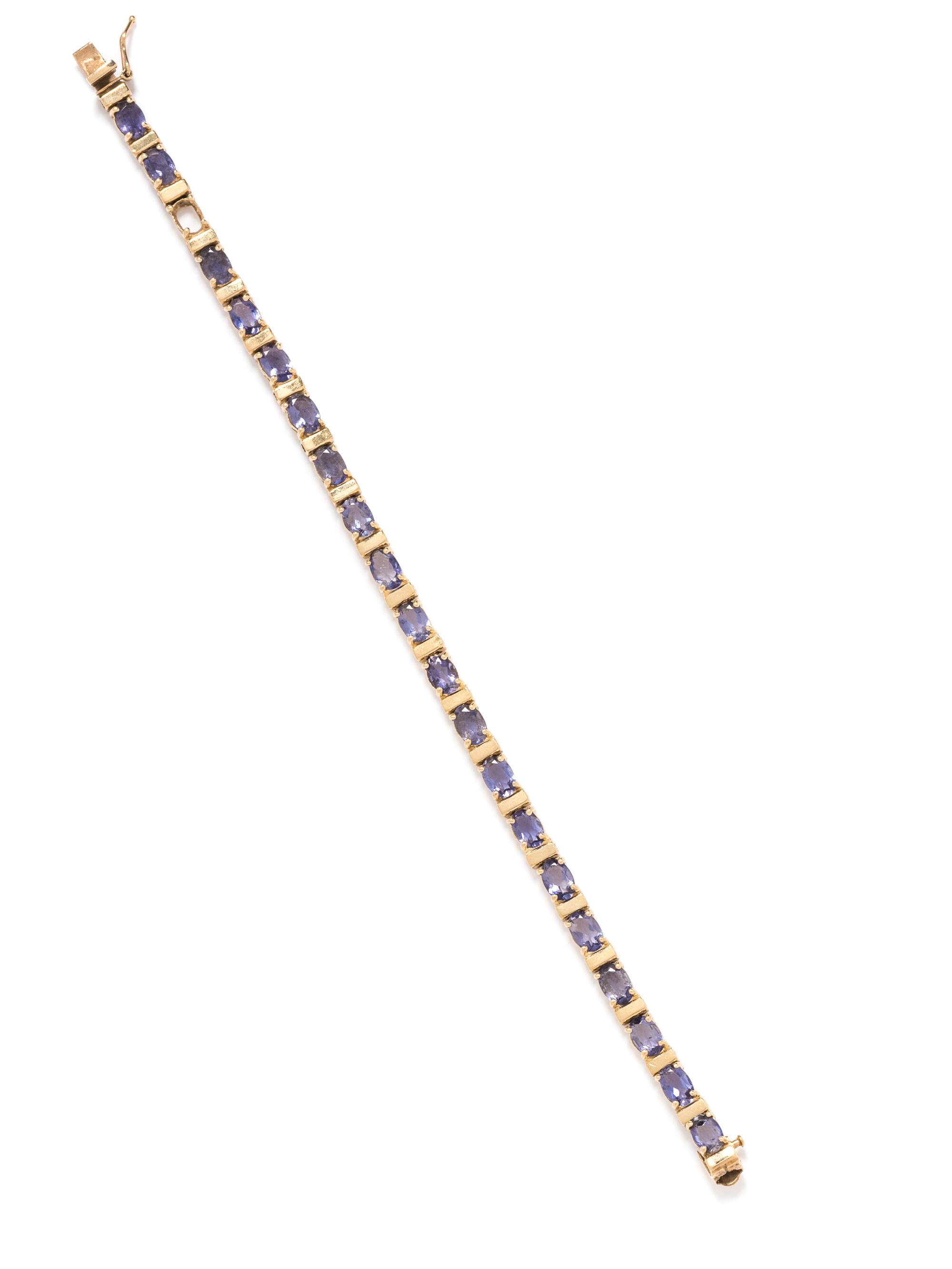 A 14 Karat Yellow Gold and Tanzanite Bracelet,