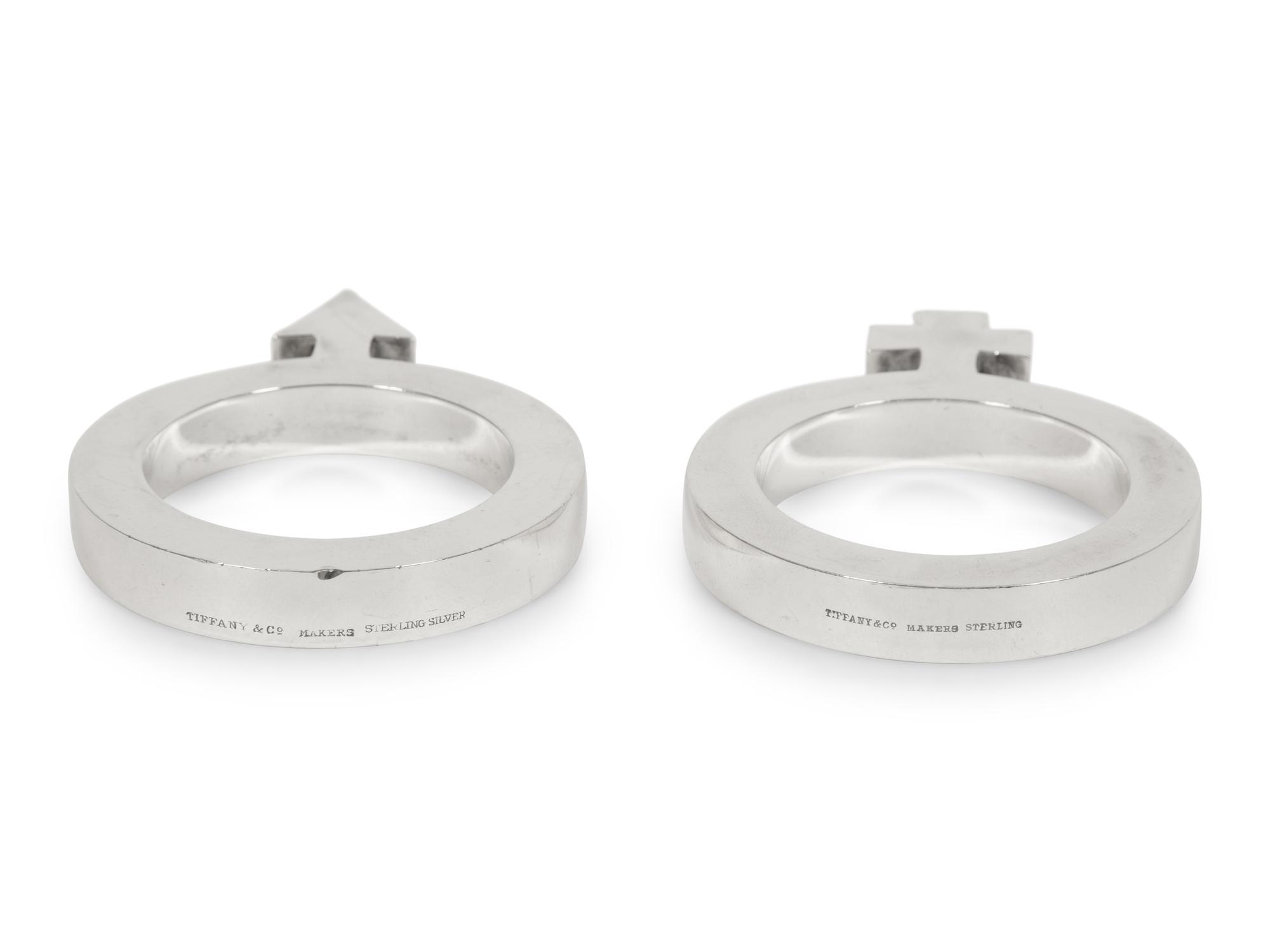 A Pair of Tiffany and Co. Silver Paperweights