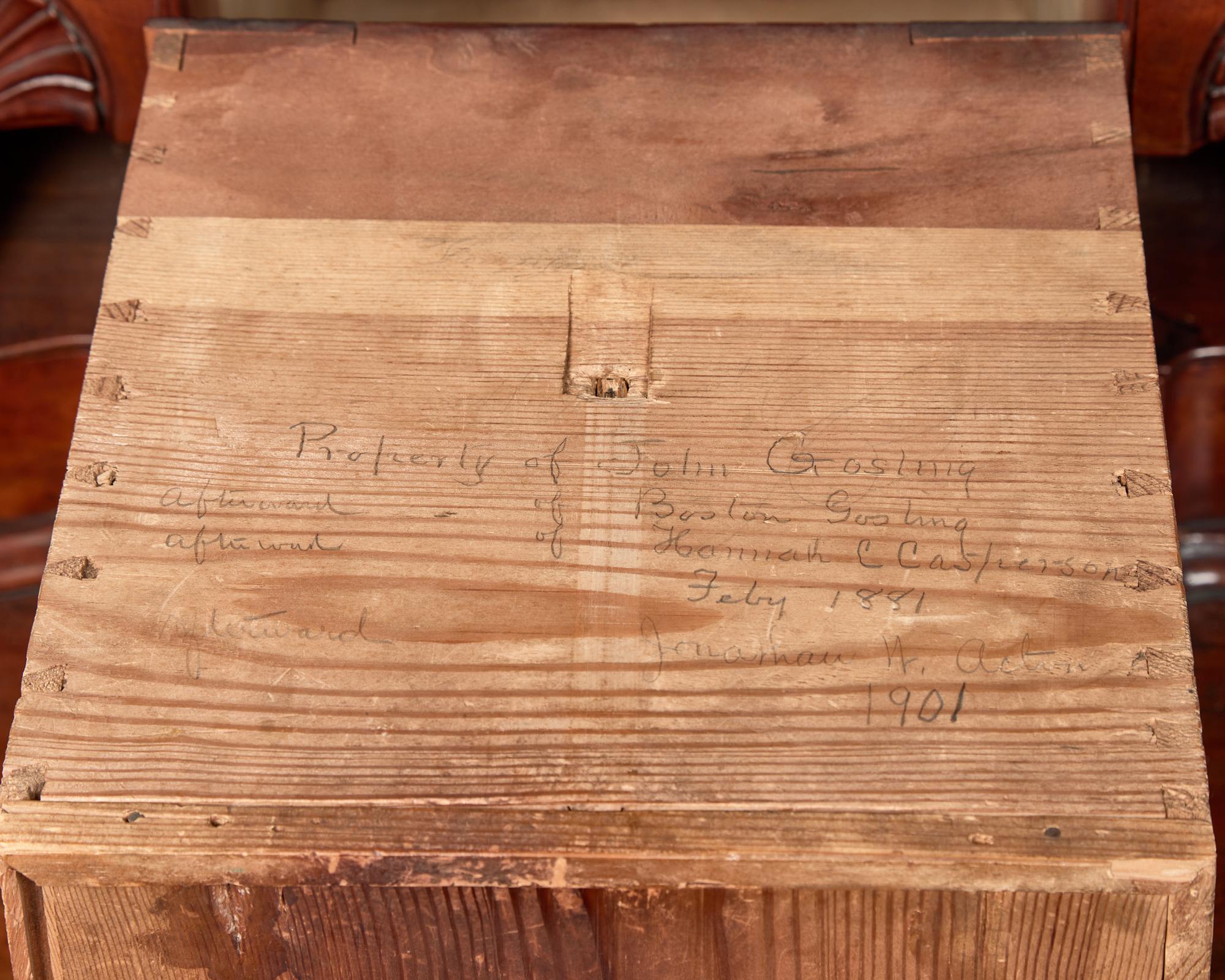 A Chippendale Carved Cherrywood Desk and Bookcase