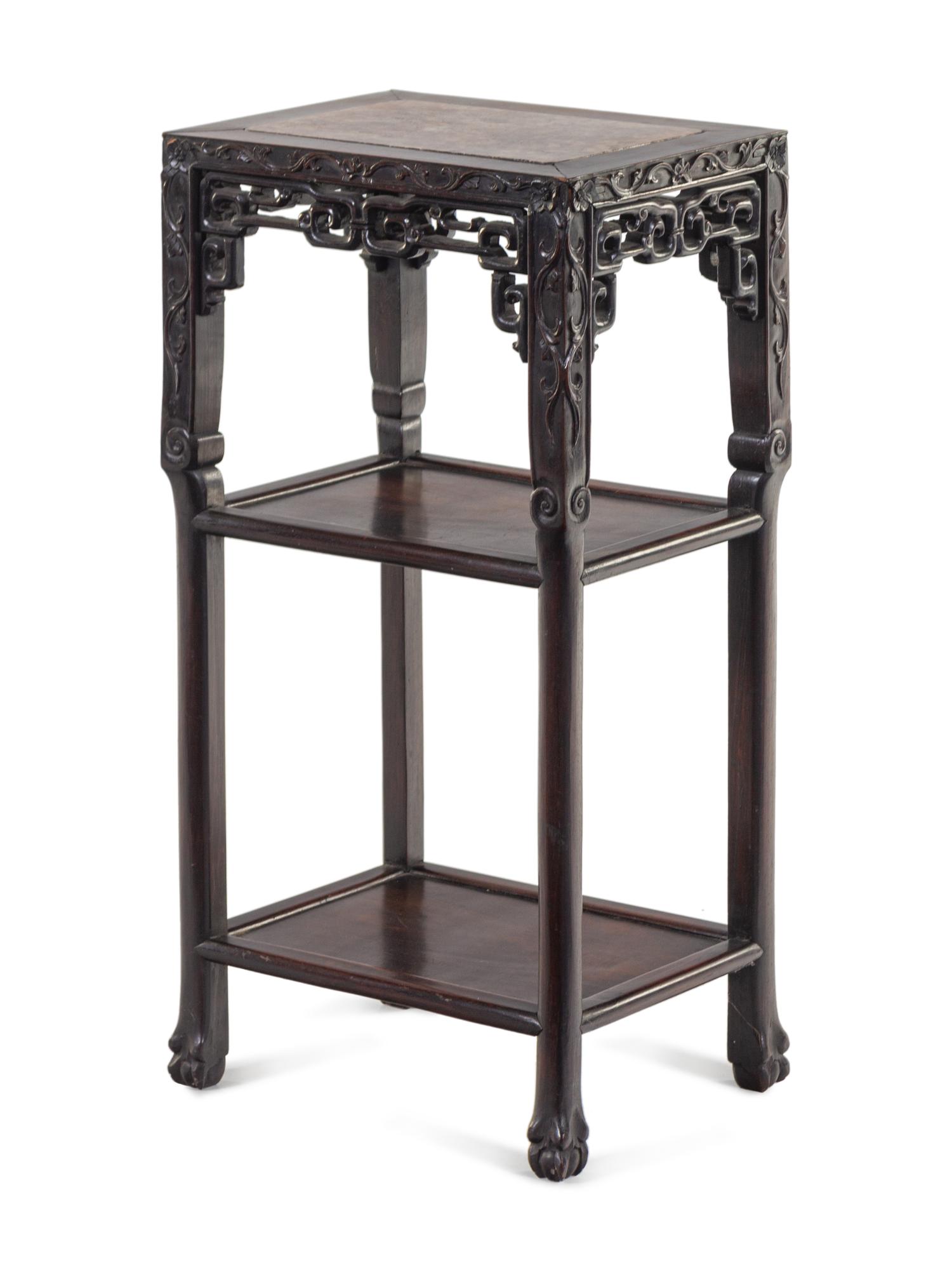 A Chinese Carved Hardwood Marble-Top Stand
