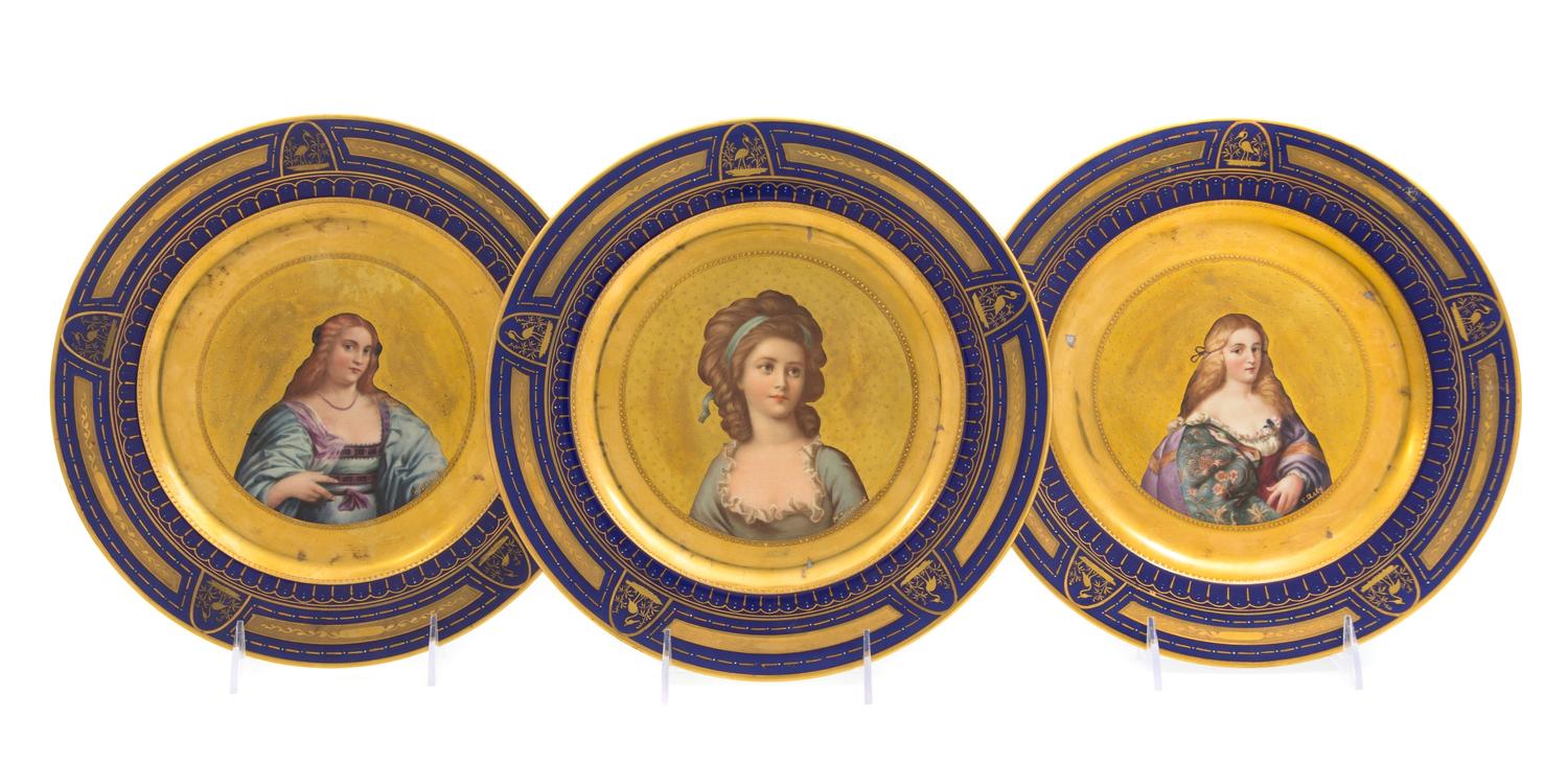 A Set of Three Royal Vienna Porcelain Plates Diameter 11 inches.
