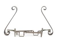 A Pair of Modernist Steel Scroll Andirons