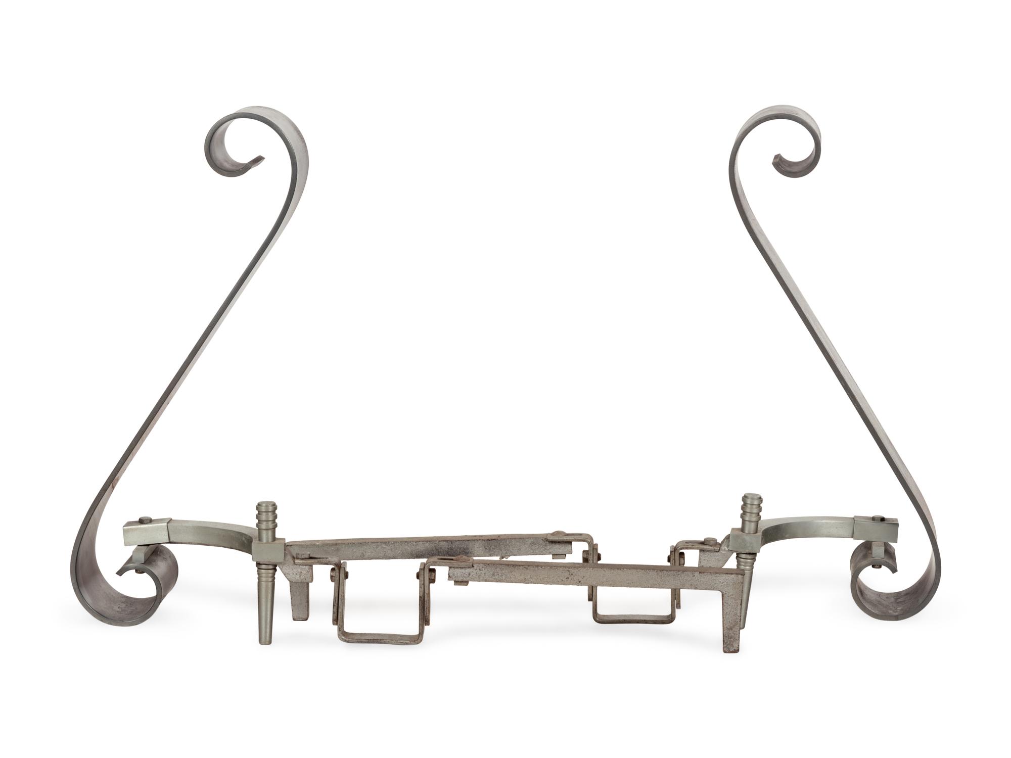 A Pair of Modernist Steel Scroll Andirons