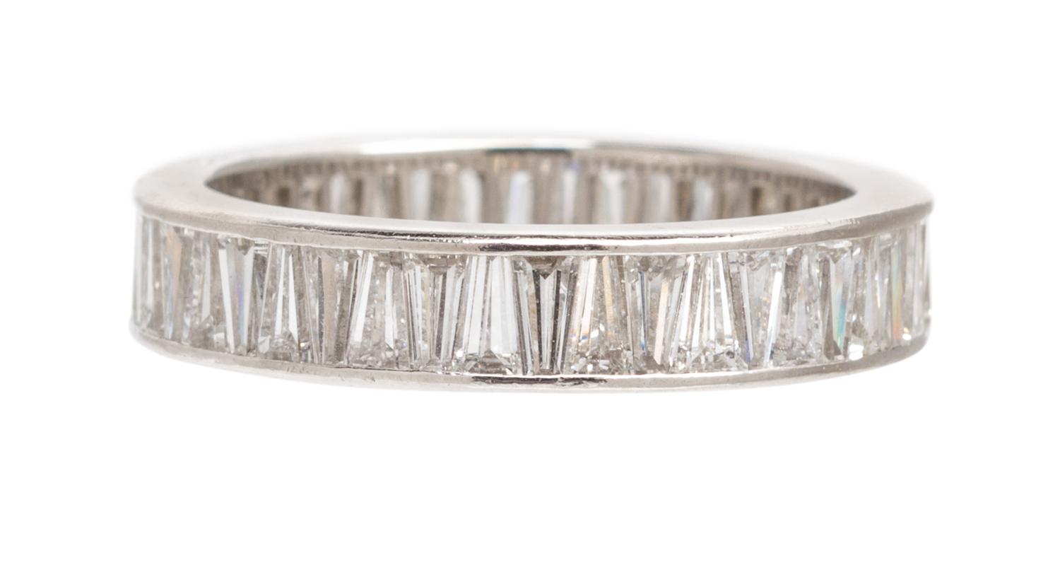 A Platinum and Diamond Eternity Band, Cartier, 3.10 dwts.