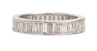 A Platinum and Diamond Eternity Band, Cartier, 3.10 dwts.