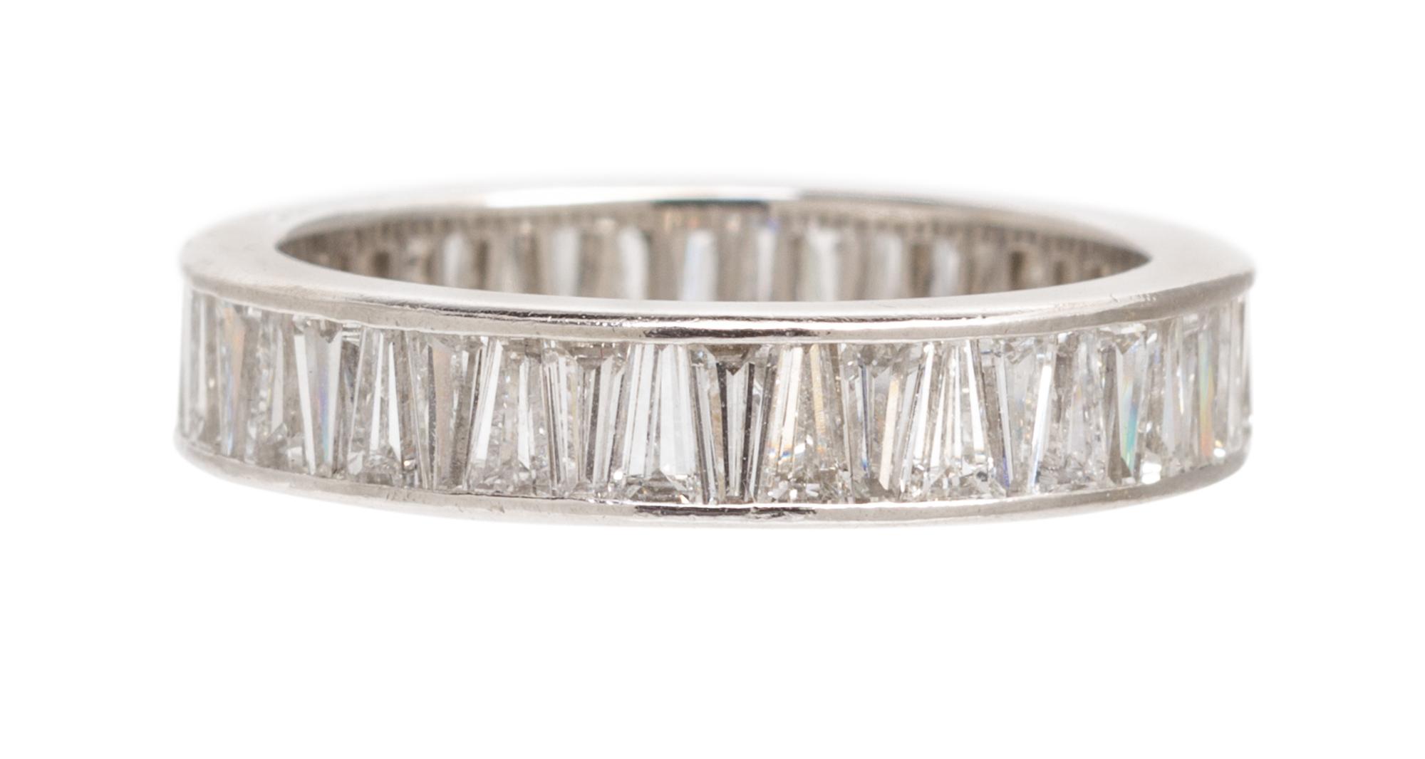 A Platinum and Diamond Eternity Band, Cartier, 3.10 dwts.