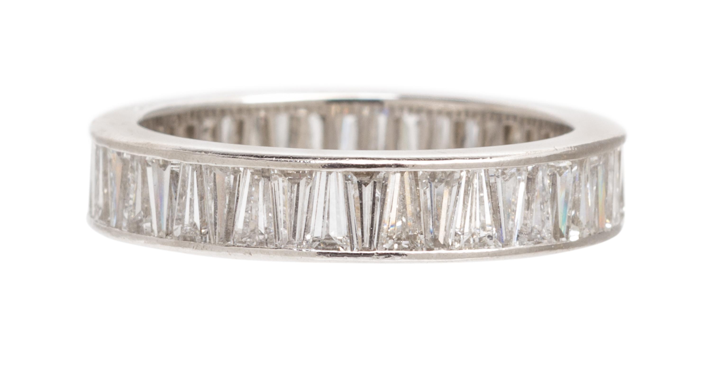 A Platinum and Diamond Eternity Band, Cartier, 3.10 dwts.