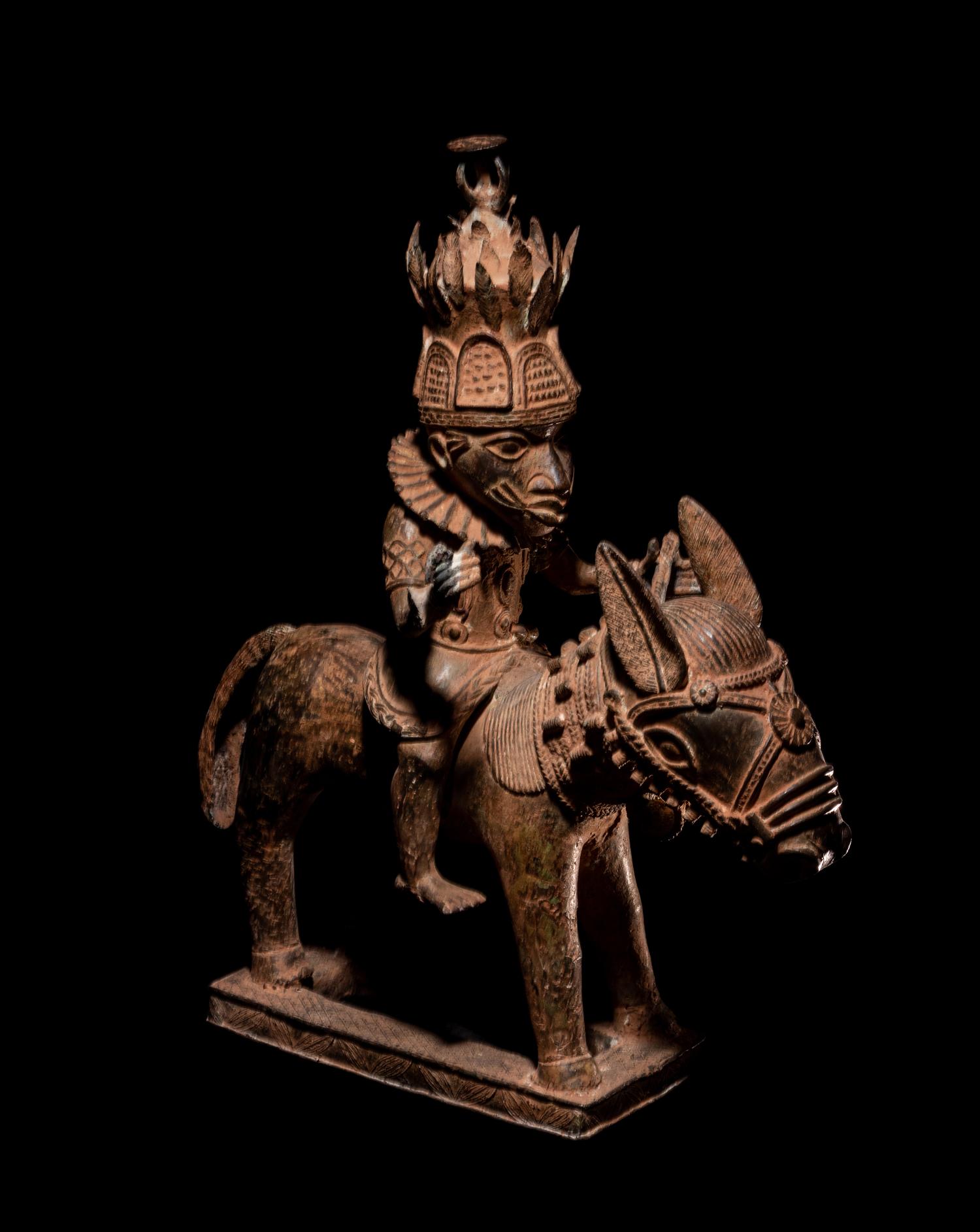 A Benin Style Bronze Equestrian