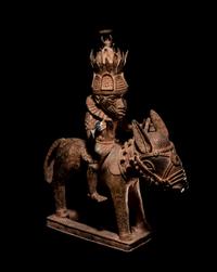 A Benin Style Bronze Equestrian