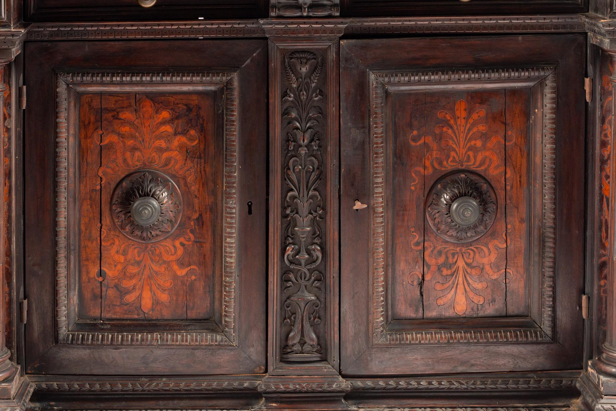 An Italian Baroque Walnut and Marquetry Cabinet