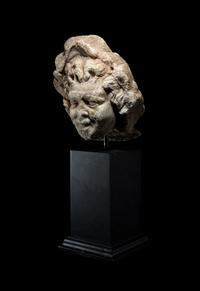 A Roman Marble Head of a Satyr