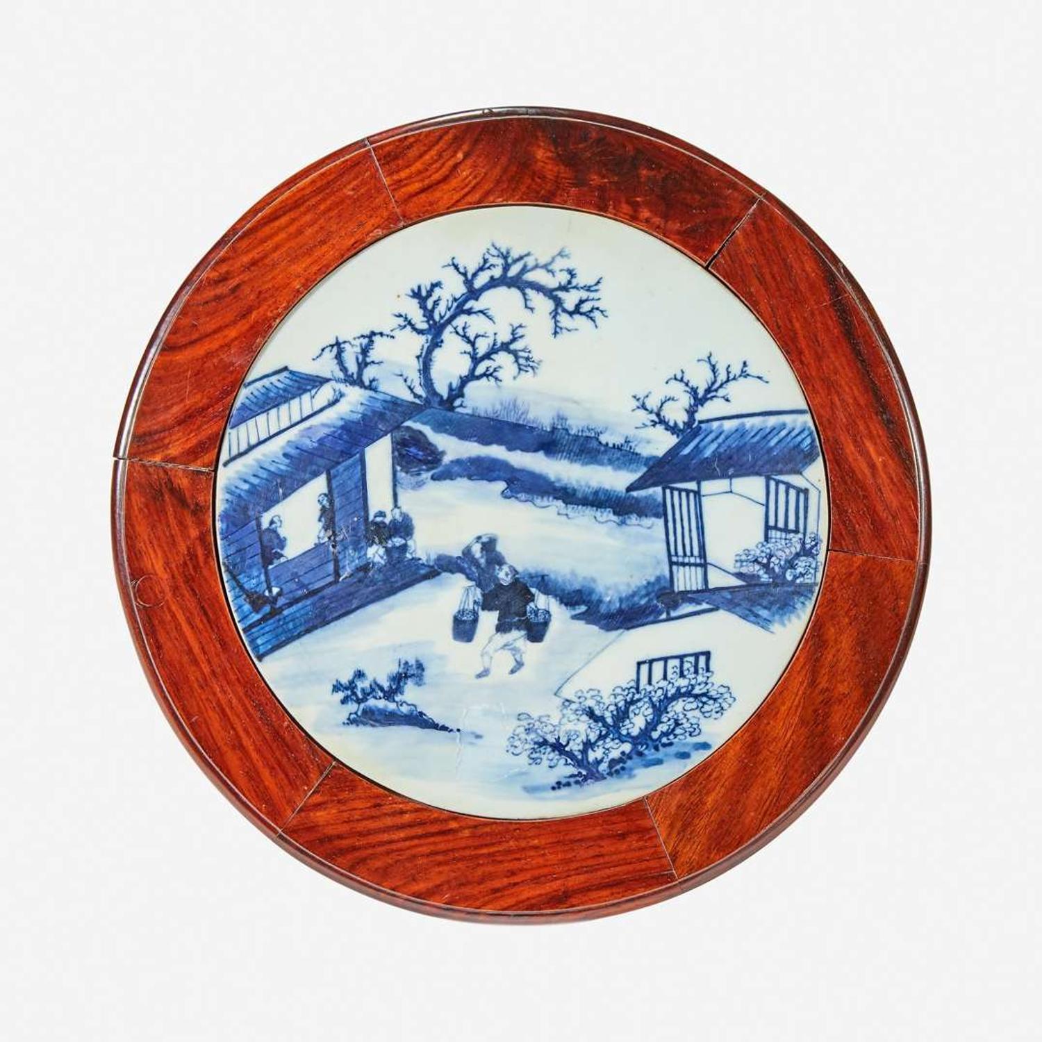 A Chinese blue and white porcelain-inset hardwood revolving small stand 20th Century
